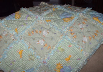 Debbie from NC makes this adorable baby rag quilt from duck fabric!