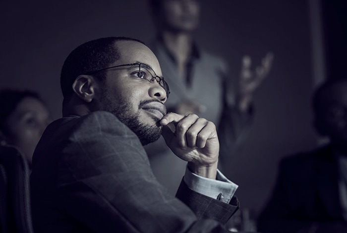 man watching presentation