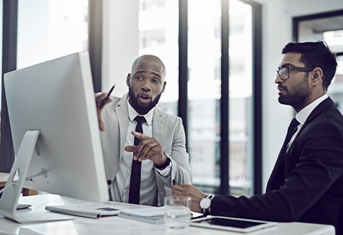 men on computer 