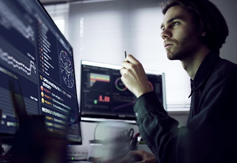 man looking at computer