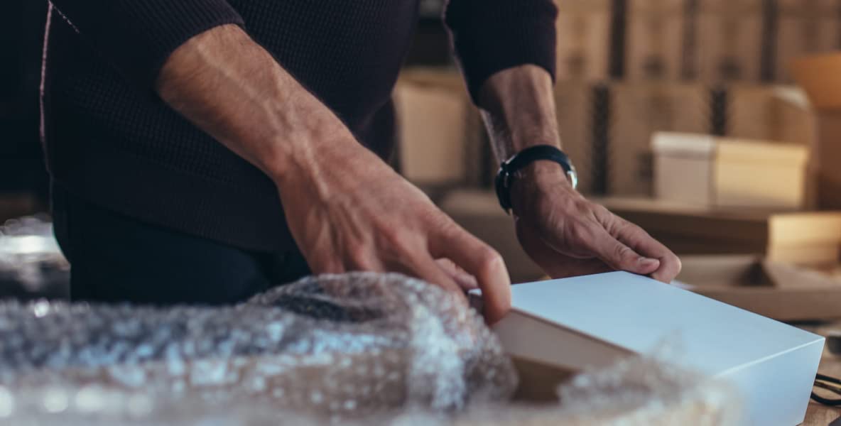 Man opening a box