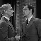 George Irving and Fredric March in Merrily We Go to Hell (1932)