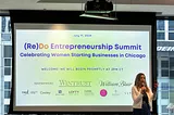 Gale Wilkinson kicks off the (Re)Do Entrepreneurship Summit on stage.