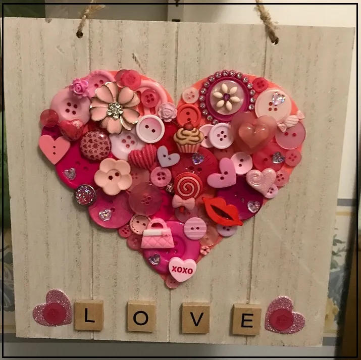 heart shaped plaque with buttons