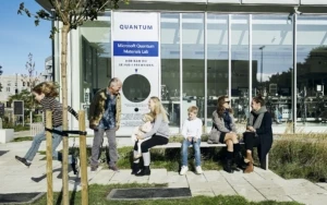 a group of people standing in front of a building