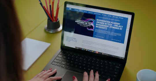 Woman typing on laptop