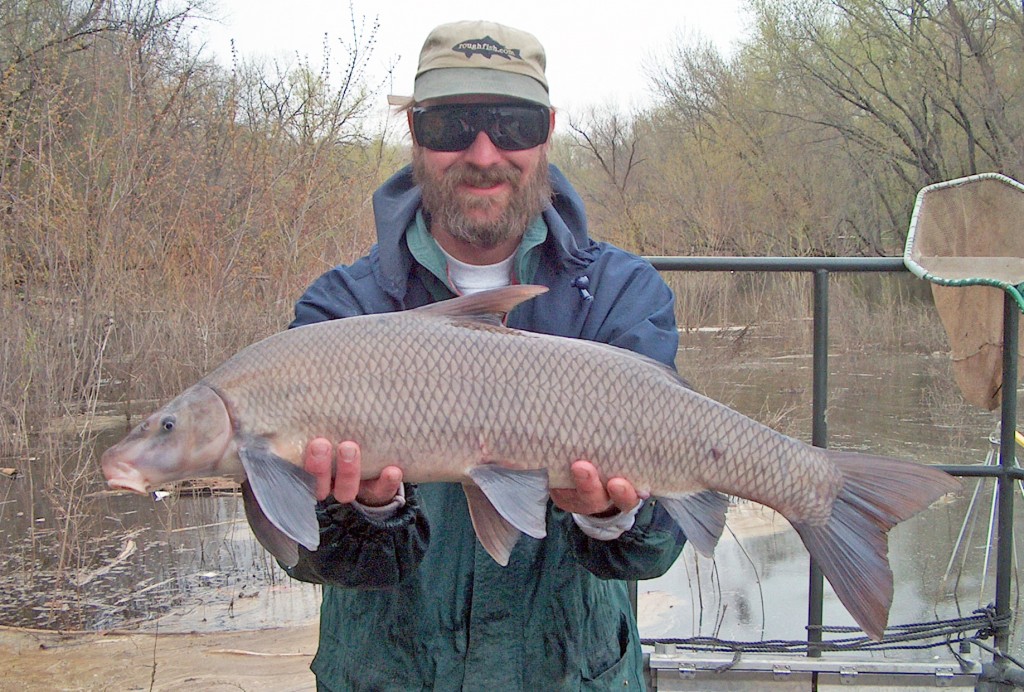 Corey Geving holding a Blue Sucker.