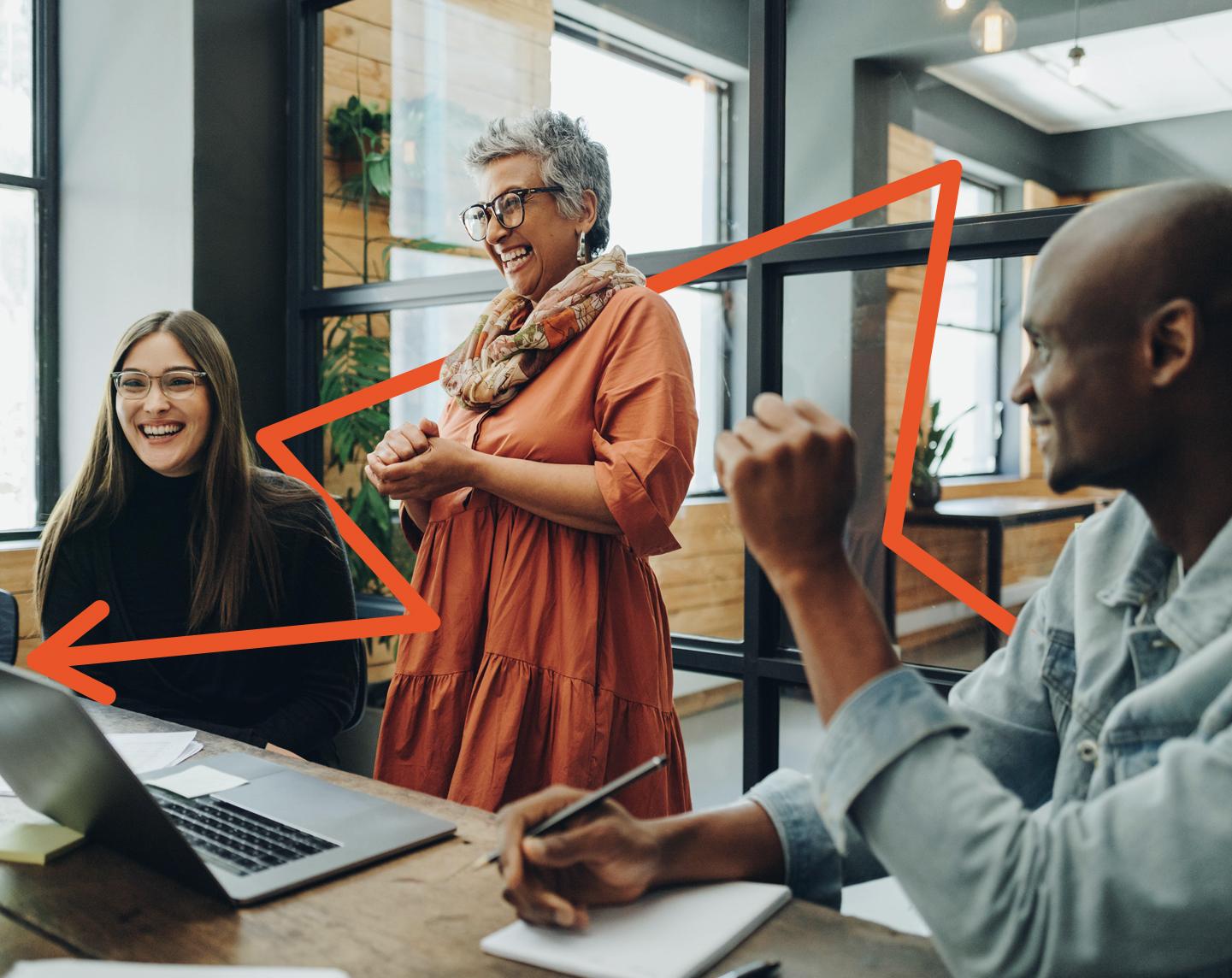 People laughing in a professional office setting