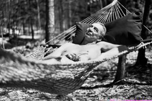 Dad, naked, in a hammock