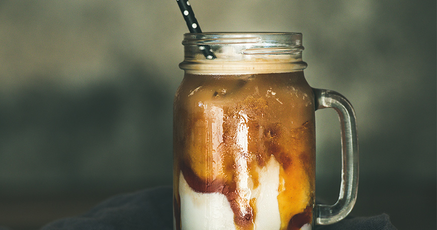 Mug of milkshake with butterscotch drizzle