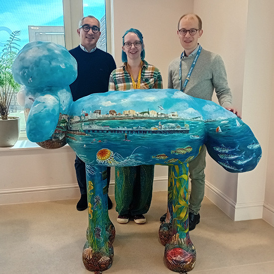 OneFamily CEO Jim Islam, artist Danni Smith, David from Martlett's and Pebble, our custom Shaun the Sheep