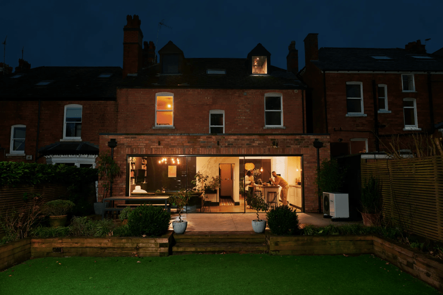 House with heat pump in the garden