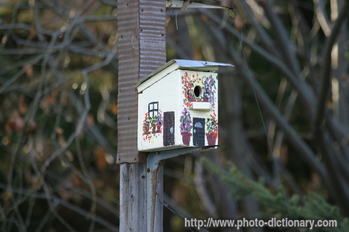 bird house - photo/picture definition - bird house word and phrase image