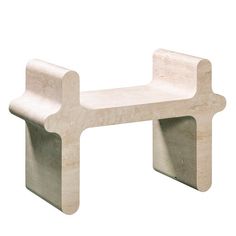 Part of a superb series of benches, tables, and seats inspired by the soft yet monumental lines that make up the pieces of Ancient Greek and Roman game "Jeu des Osselets", this exquisite chair will effortlessly enliven any modern decor. Entirely crafted of Travertine marble showcasing a light beige hue, it can be paired with others from the Ossicle Collection for a more cohesive look. Other sizes are available upon request.