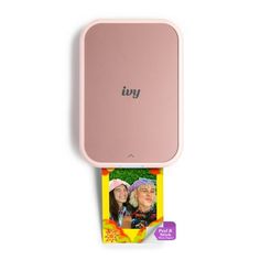 a pink portable photo frame with an image of two women in the back and one on top