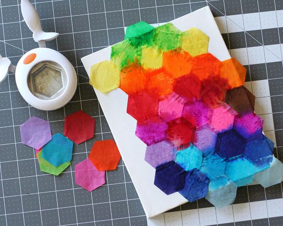 Fiskars Hexagon punch tissue paper on a canvas