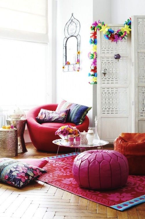 #Bohemian living room #decor with #parquet floors, #Moroccan #pouf, and white #screen room divider.