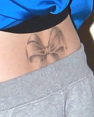 Cher Lloyd’s Large Bow Back Tattoo