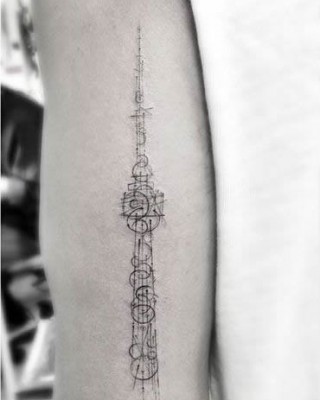 Drake Covers His CN Tower Tattoo, Then Gets Another One!