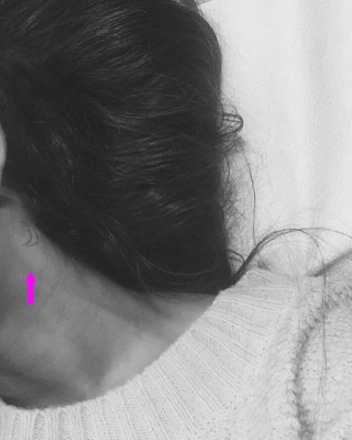 Ariana Grande Debuts Crescent Moon Neck Tat During The Honeymoon Tour