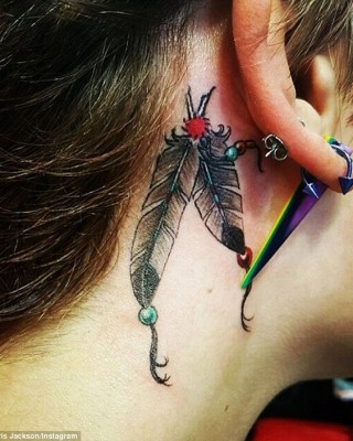 Paris Jackson’s Latest Tattoo a Double Feather Inked Behind Her Ear