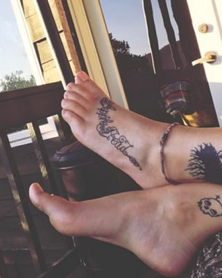 Paris Jackson’s Latest Tribute to MJ is an “Apple Head” Tat on Her Foot