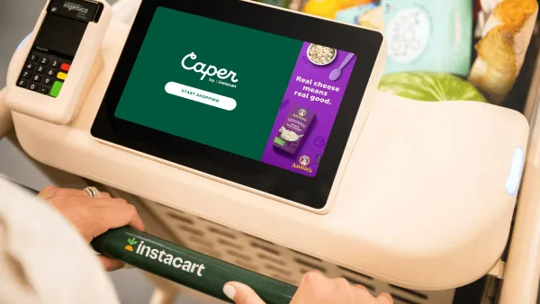 A person pushes an Instacart Caper Cart