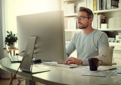 A man working in the system at home.