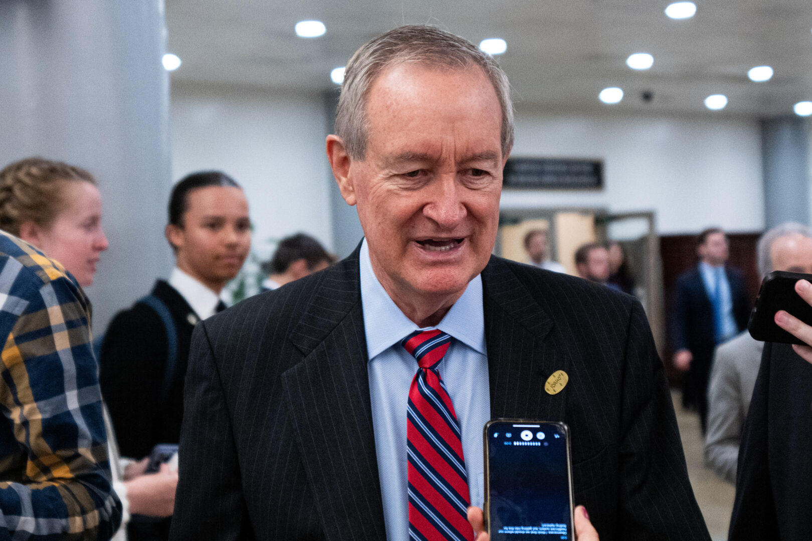 Sen. Michael D. Crapo, R-Idaho, speaks with reporters after a vote in the Capitol on Sept. 11. 