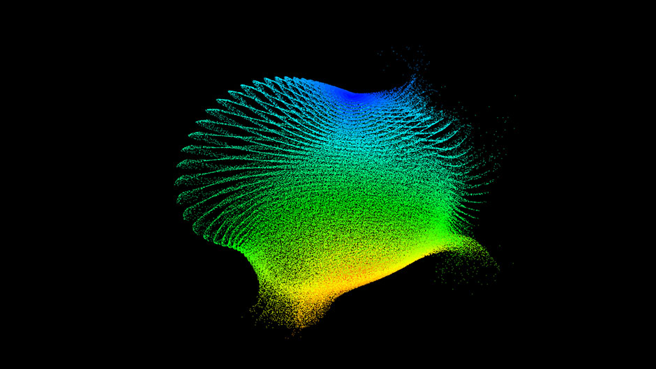 A distorted sphere composed of hundreds of thousands of colored particles.