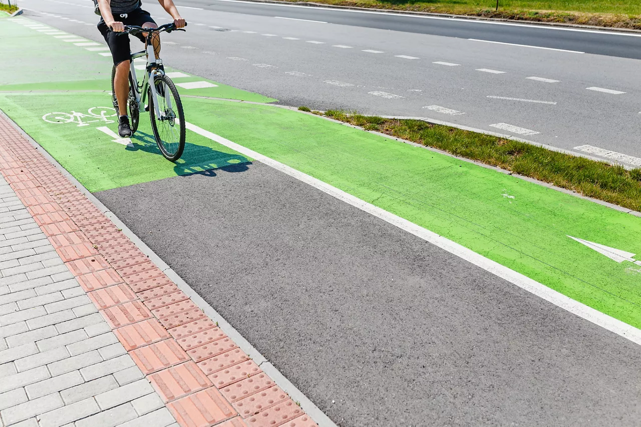 Close-up of commuter in bike lane