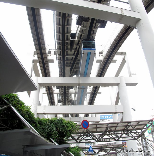 The monorail hanging on to the tracks coming in to Chiba Station