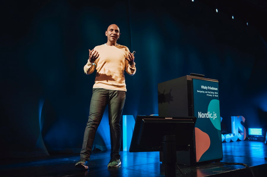 Vitaly on stage, presenting at Nordic.js in 2019.