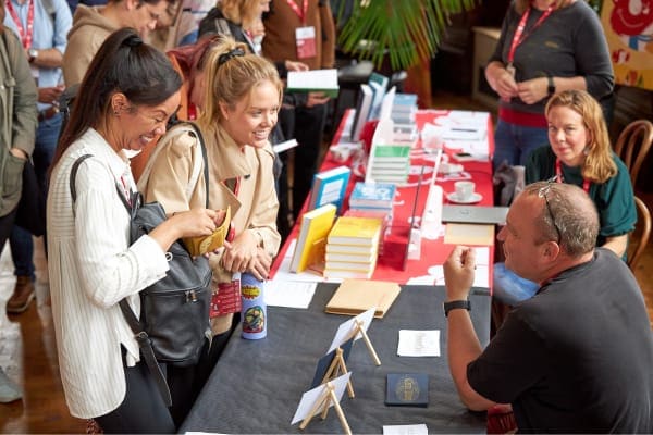 Seb Lester signing prints at SmashingConf Antwerp 2023