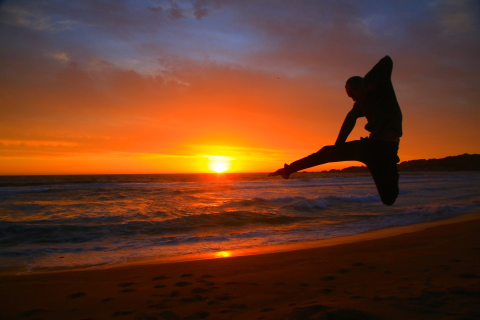 We were running on the beach jumping and taking these silly kung fu pictures. It was so funny at the time and more of a work out than we had planned.