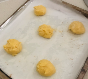 Saffron cardamom orange and almond profiteroles