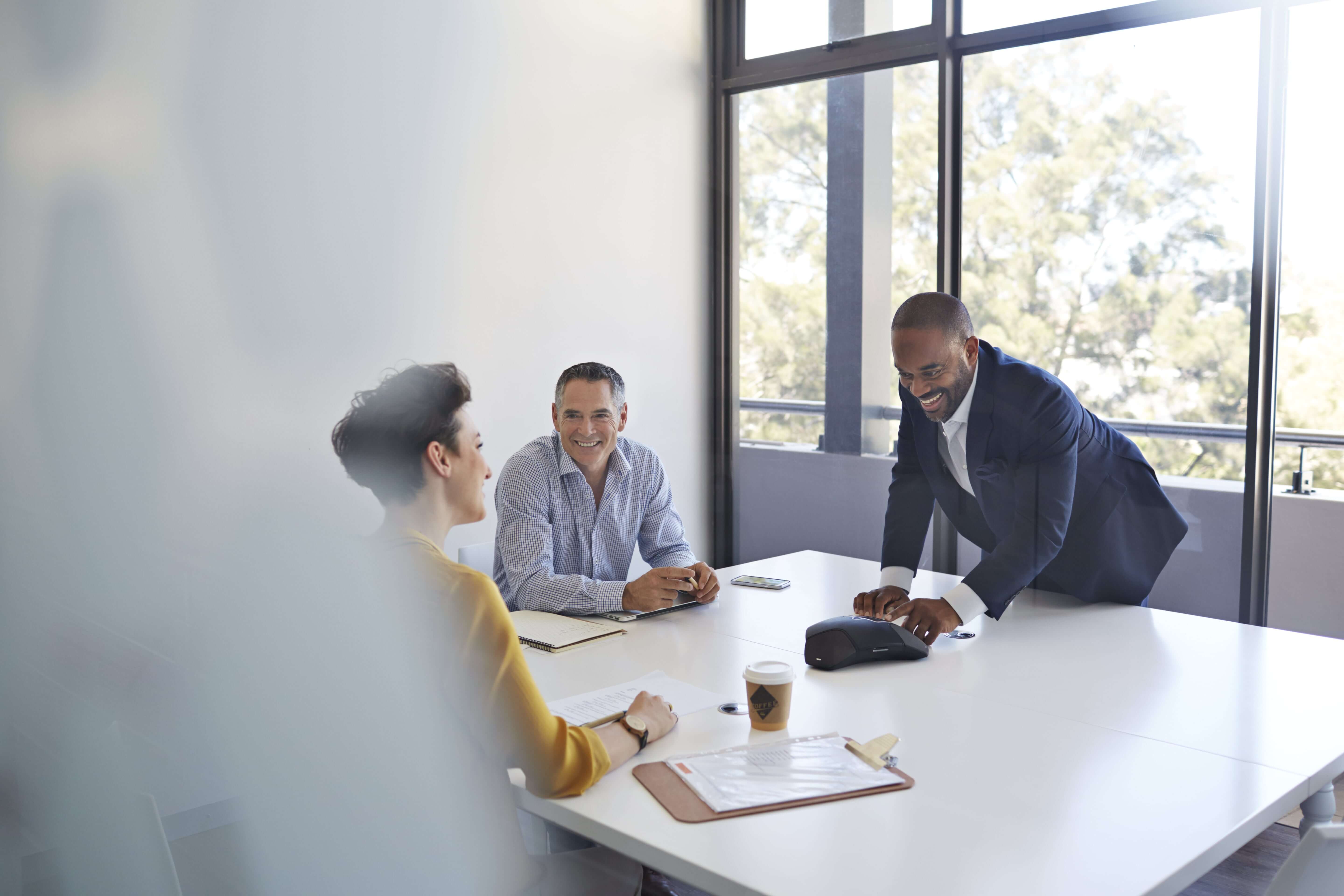 male employee leading a meeting