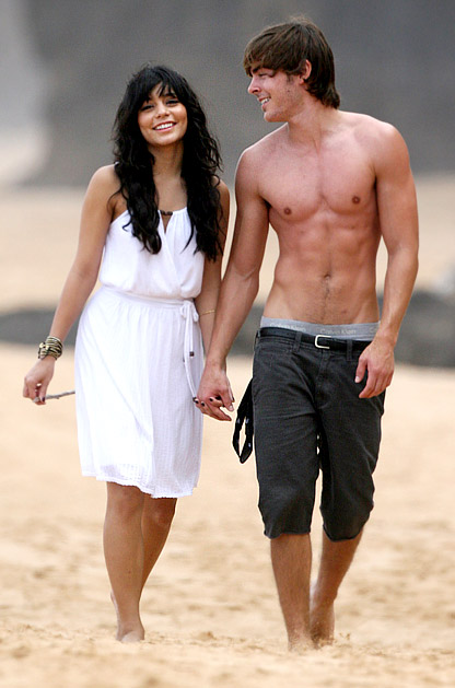 Shirtless Zac Efron and Vanessa Hudgens. Zanessa heats up a Hawaiian beach.