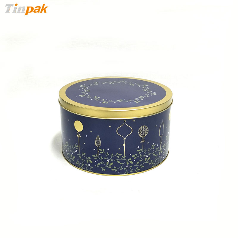 Empty round metal tin cookie box