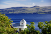 Kirkjubøur, Streymoy island, Faroes: Olavskirkjan - Saint Olav's church - Hestsfjørdur and Hestur island in the background - photo by A.Ferrari