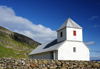 Kirkjubøur, Streymoy island, Faroes: whitewashed walls of Saint Olav's church - Olavskirkjan - photo by A.Ferrari