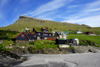 Leynar village, Streymoy island, Faroes: view from the beach - houses and Satan peak - municipality of Kvívíkar - photo by A.Ferrari