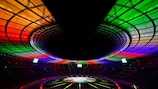 The Olympic stadium is lit up with the colors of the new UEFA Euro 2024 football championship logo presented at the Olympic stadium in Berlin, on October 5, 2021. (Photo by John MACDOUGALL / AFP) (Photo by JOHN MACDOUGALL/AFP via Getty Images)