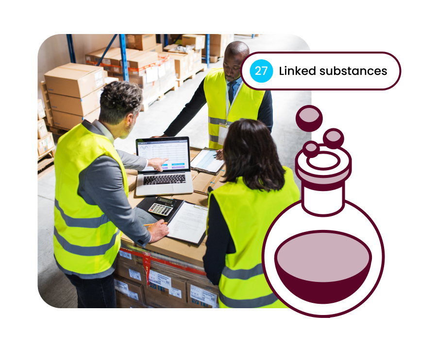 Business colleagues collaborating at a table inside a warehouse