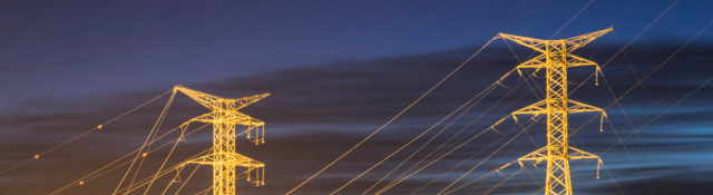 Electricity pylons at sunset