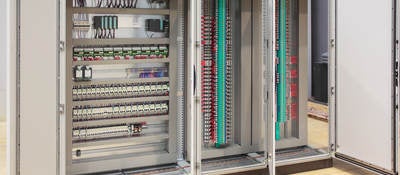 The inside of an industrial control panel board.