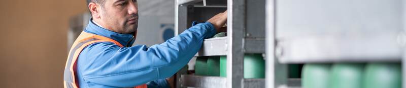 Engineer checking gas cylinders