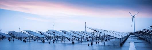 Large wind turbines and solar panels