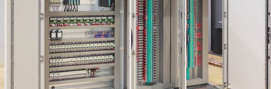 The inside of an industrial control panel board.