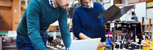 People working on a laptop